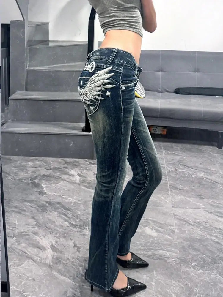 Zhuolin Wing Embroidered Low-Rise Jeans - ATSProducts